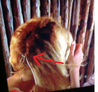 Well, hello there, Christy's hair extension tracks. (Thanks to Twitter follower Janet for this!) 