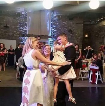 Tyler dances with Carly during his wedding.